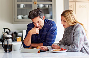 Couple looking at mobile device