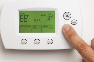 Hand adjusting thermostat